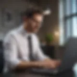 A modern accountant working on a laptop in a trendy office space